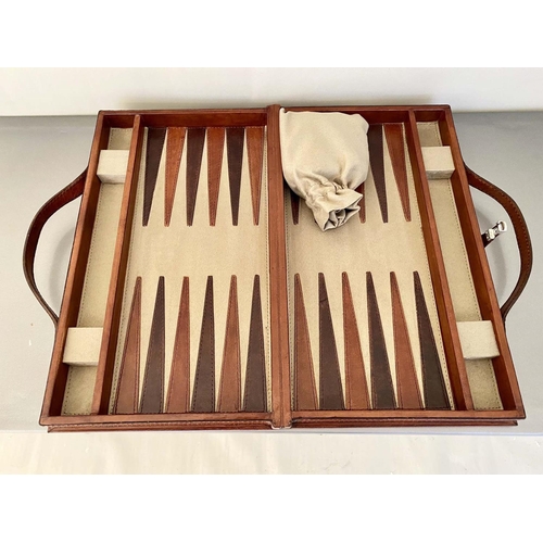 426 - BACKGAMMON SET, in leathered case, 7cm x 23cm x 40cm.