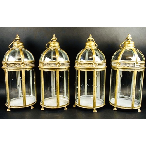 452 - STORM LANTERNS, a set of four, 46cm high x 19cm diameter, Regency style, gilt metal frames. (4)