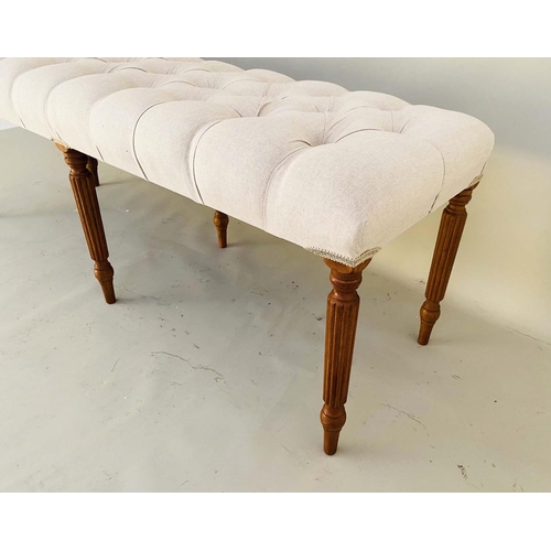 455 - HALL SEAT, 51cm H x 122cm W x 44cm D, deep buttoned neutral upholstery, raised on turned legs.