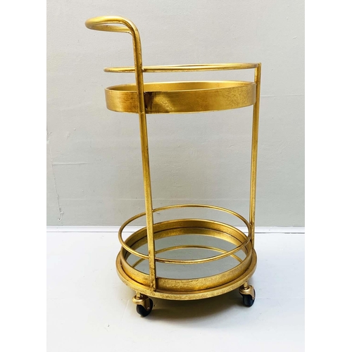 458 - COCKTAIL TROLLEY, 77cm high, 42cm diameter, 1960s French style, mirrored glass tiers, gilt metal fra... 