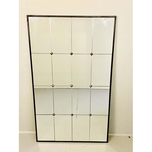 459 - ARCHITECTURAL WALL MIRROR, segmented plate in black frame, gilt stud detail, 120cm x 70cm.