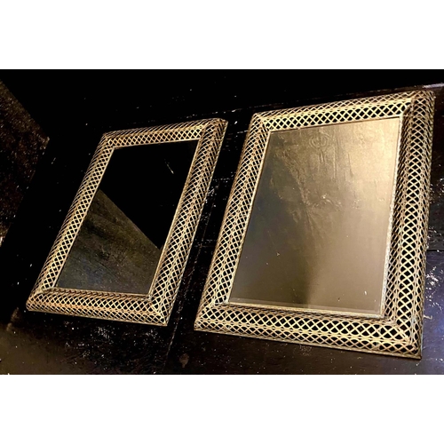 466 - ARCHITECTURAL WALL MIRRORS, a pair, 100cm high, 70cm wide, Regency style, pierced gilt metal frames.... 