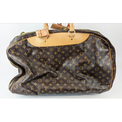 13 - VINTAGE LOUIS VUITTON ALIZE 55 TRAVEL BAG, monogram canvas with three large zippered compartment, on... 