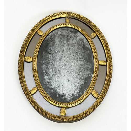 184 - SMALL WALL MIRROR, George III giltwood oval frame with a foxed plate, 52cm x 39cm.