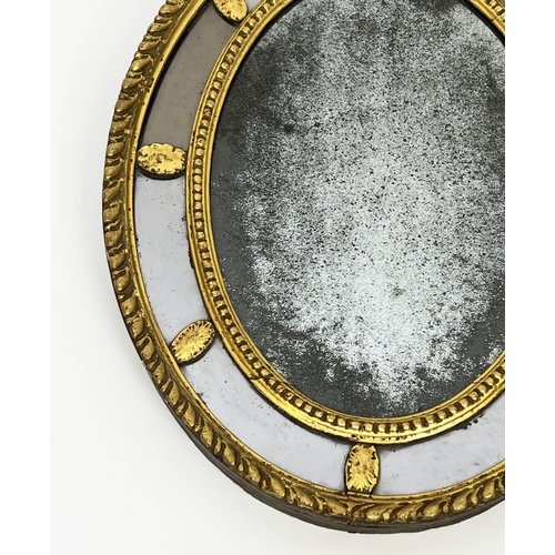 184 - SMALL WALL MIRROR, George III giltwood oval frame with a foxed plate, 52cm x 39cm.