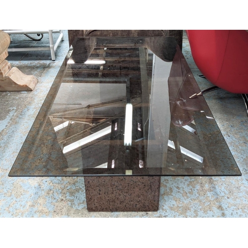 305 - LOW TABLE, 150cm x 75cm x 38cm, stone twin pedestal base, smoked bevelled glass top.