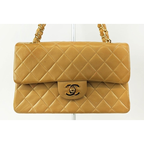 34 - VINTAGE CHANEL FLAP BAG, with front flap closure and iconic interlocking CC lock, leather and chain ... 