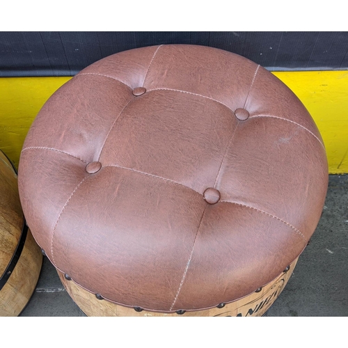 375 - BARREL STOOLS, a pair, with faux leather upholstered seats, which lift of to reveal internal insuran... 