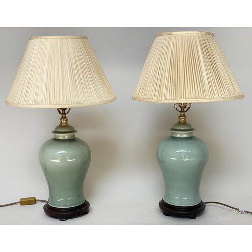 232 - TABLE LAMPS, a pair Chinese celadon ceramic ginger jar form, with silk pleated shades, 68cm H. (2)