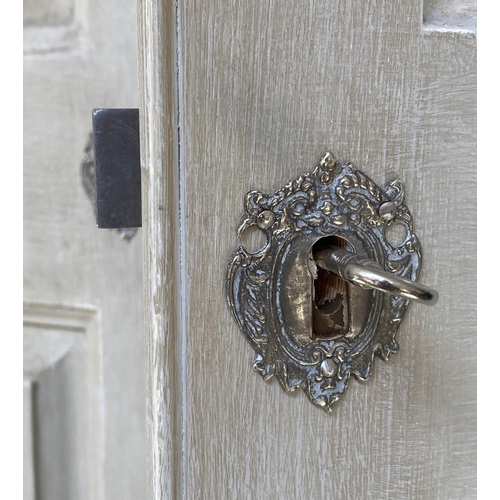 285 - ARMOIRE, French style traditionally grey painted with two panelled doors, enclosing hanging above a ... 