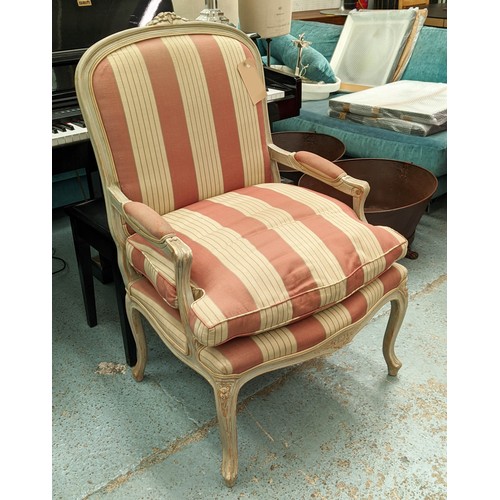 192 - FAUTEUIL, with a carved distressed show frame and striped upholstery, 70cm x 110cm H.