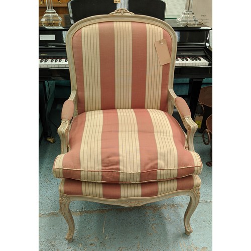 192 - FAUTEUIL, with a carved distressed show frame and striped upholstery, 70cm x 110cm H.