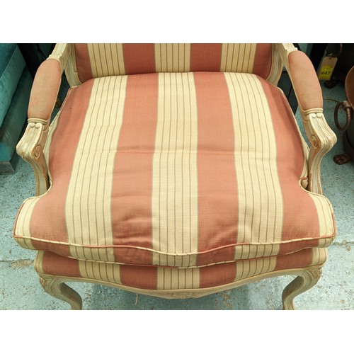 192 - FAUTEUIL, with a carved distressed show frame and striped upholstery, 70cm x 110cm H.