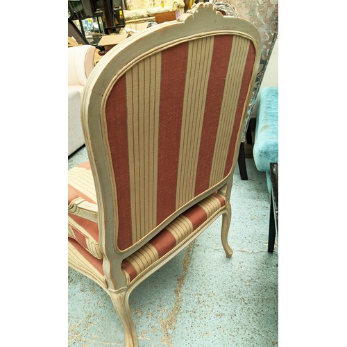 192 - FAUTEUIL, with a carved distressed show frame and striped upholstery, 70cm x 110cm H.