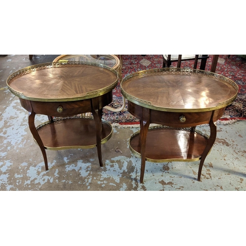 244 - OCCASIONAL TABLES, a pair, the figured mahogany oval tops with pierced brass gallery with undertier,... 