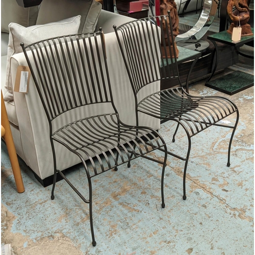 274 - DINING CHAIRS, a set of twelve, black iron frame, slatted backs and seats, 87cm H x 45cm x 60cm D. (... 