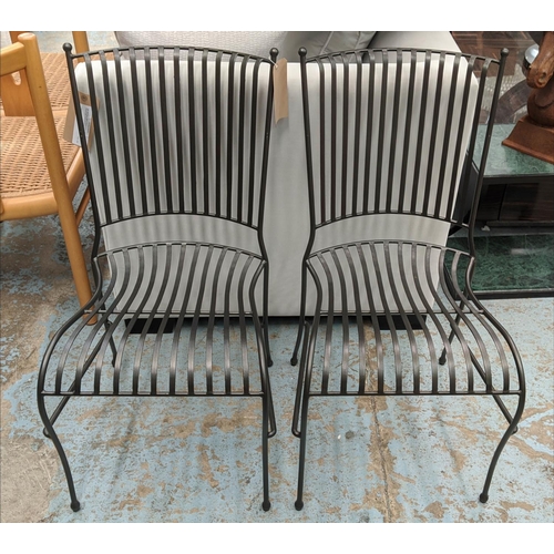 274 - DINING CHAIRS, a set of twelve, black iron frame, slatted backs and seats, 87cm H x 45cm x 60cm D. (... 