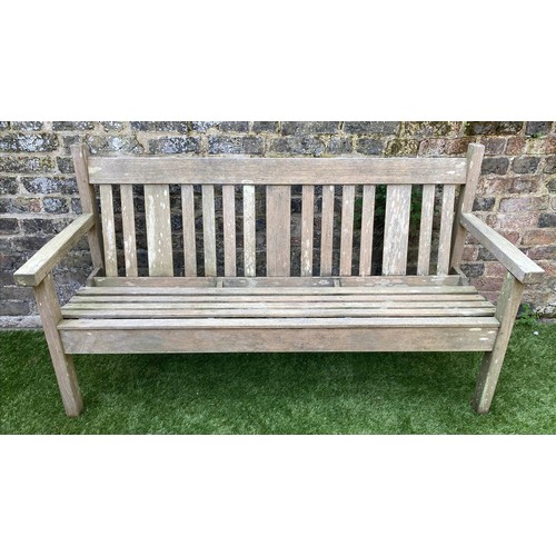 264 - GARDEN BENCH BY LISTER, 154cm W, weathered teak of slatted construction.