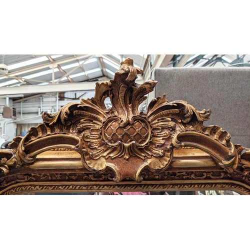 425 - WALL MIRROR, Continental style, gilt frame, bevelled plate.