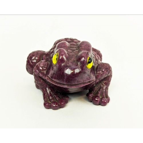 5 - A RUBY CARVED TOAD, glass eyes, initialled 'H.W.', 4cm long, 72 grams.