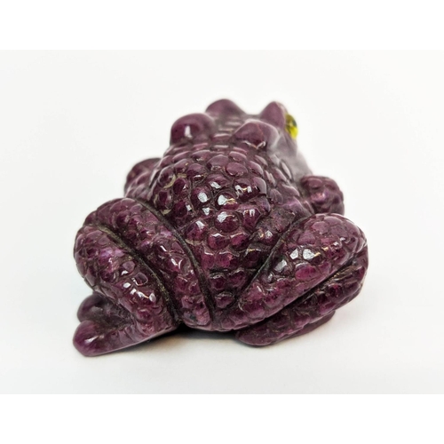 5 - A RUBY CARVED TOAD, glass eyes, initialled 'H.W.', 4cm long, 72 grams.