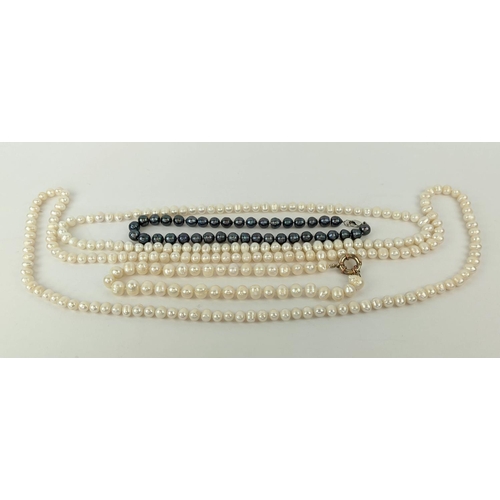 6 - FOUR FRESHWATER PEARL NECKLACES, comprising three white pearl necklaces and one peacock pearl neckla... 