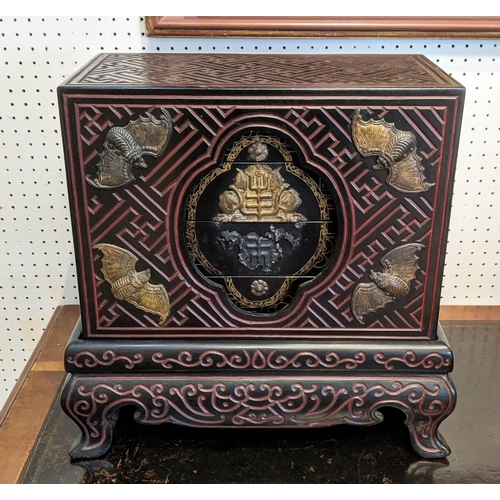 10 - CHINESE COMPARTMENTALISED LACQUERED BOX ON STAND, in four sections, incised decoration with metal ba... 