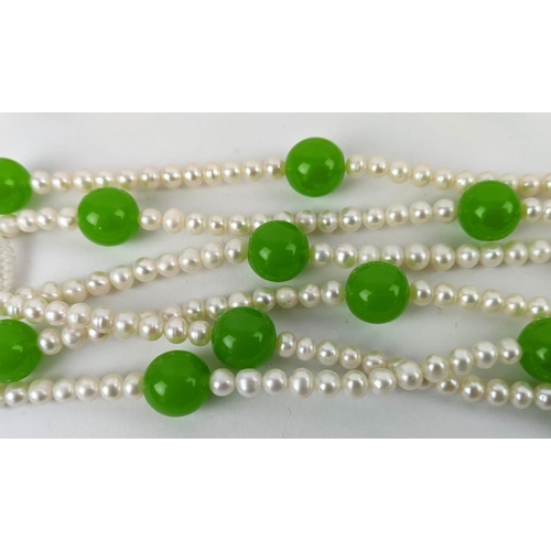 11 - A COLLECTION OF ASSORTED DYED JADE AND FRESHWATER PEARL NECKLACE AND BRACELET SETS, comprising many ... 