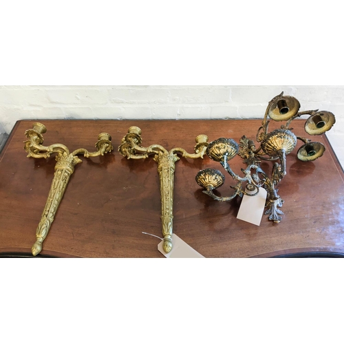 27 - BRASS WALL SCONCES, a pair, each with three branch, 16cm H x 32cm, and another pair gilt, each 47cm ... 