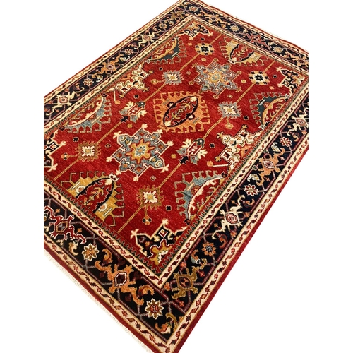 102 - FINE HERIZ RUG, 216cm x 150cm.