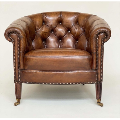 131 - TUB LIBRARY ARMCHAIRS, a pair, Edwardian style deep buttoned tan brown leather upholstered with bow ... 