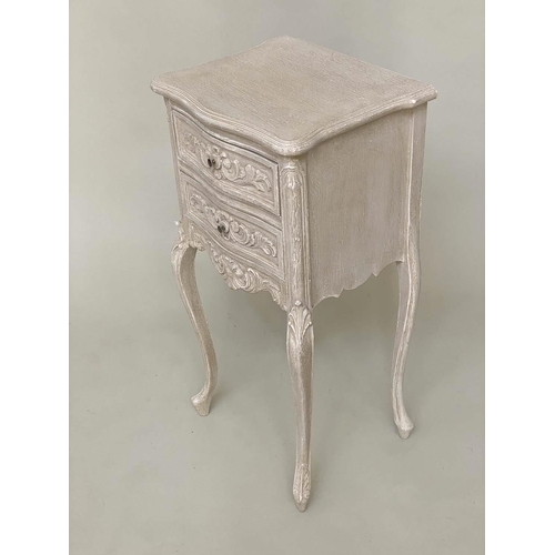 135 - BEDSIDE CHESTS, a pair, French Louis XV style traditionally carved and grey painted each with two dr... 