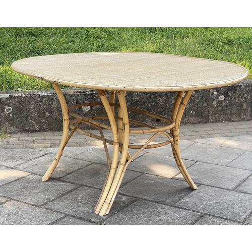 137 - DINING TABLE, 1970's oval bamboo framed and cane and wicker panelled, 151cm x 11cm D x 74cm H.