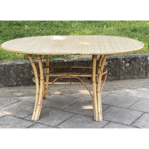 137 - DINING TABLE, 1970's oval bamboo framed and cane and wicker panelled, 151cm x 11cm D x 74cm H.