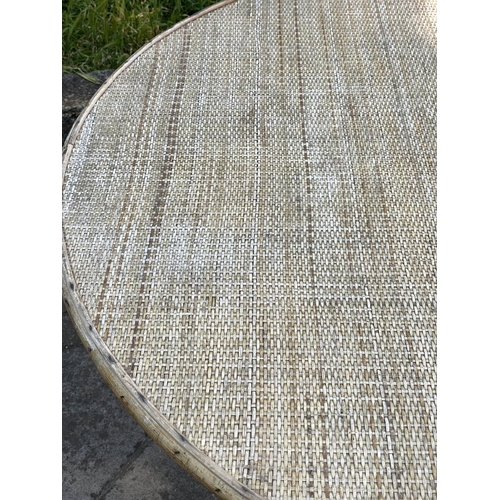 137 - DINING TABLE, 1970's oval bamboo framed and cane and wicker panelled, 151cm x 11cm D x 74cm H.