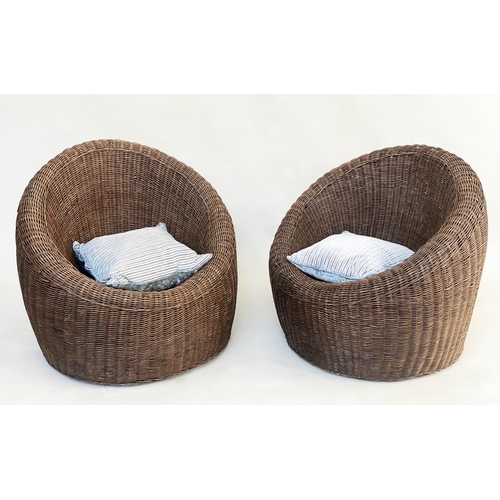 138 - CONSERVATORY ARMCHAIRS, a pair, brown woven cane of rounded form, 87cm W. (2)