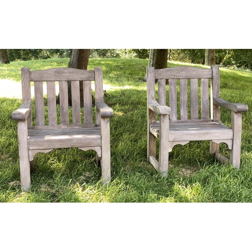 140 - GARDEN ARMCHAIRS, a pair, silvery weathered teak of substantial slatted and pegged construction by W... 