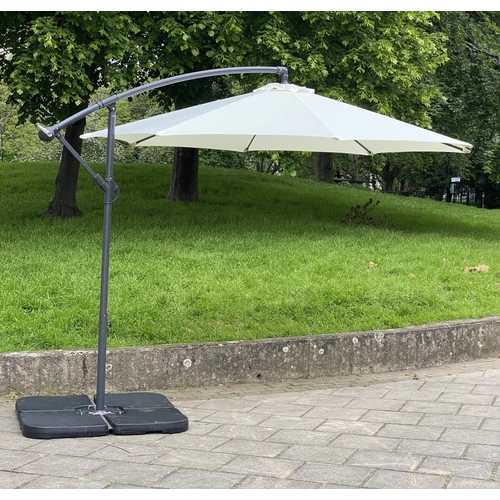 141 - GARDEN SUN UMBRELLA, circular cream canvas retractable wind up with frame and weights, 300cm W.