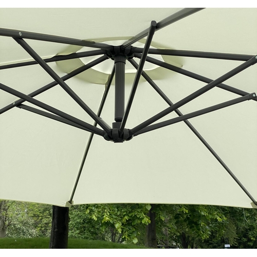 141 - GARDEN SUN UMBRELLA, circular cream canvas retractable wind up with frame and weights, 300cm W.