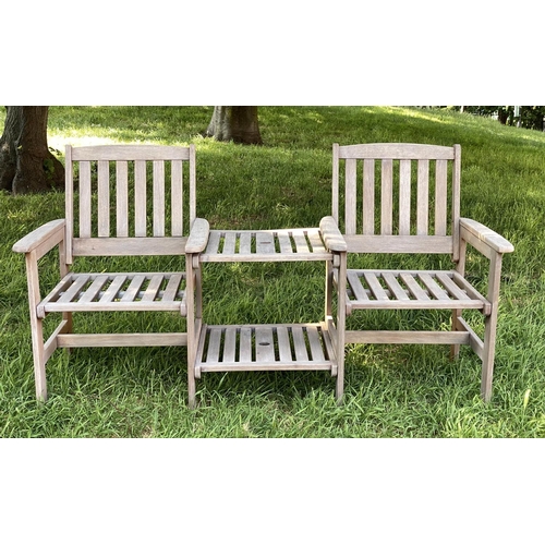 144 - CONVERSATION GARDEN SEAT, weathered slatted teak with two armchairs and conjoining two tier table, 1... 