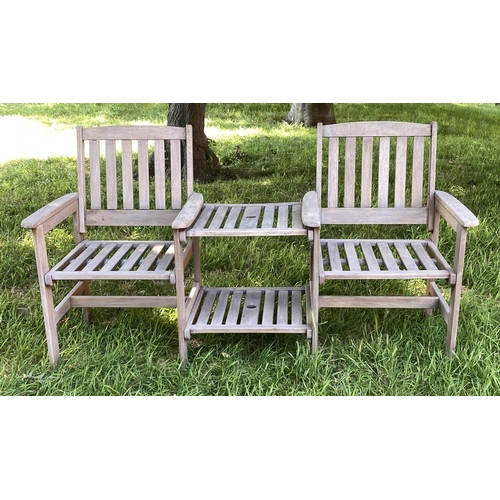 144 - CONVERSATION GARDEN SEAT, weathered slatted teak with two armchairs and conjoining two tier table, 1... 