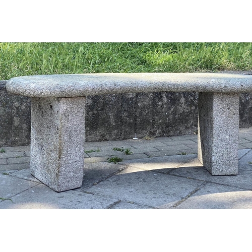 145 - GARDEN SEAT, weathered reconstituted stone of arched form with block supports, 120cm x 45cm H.