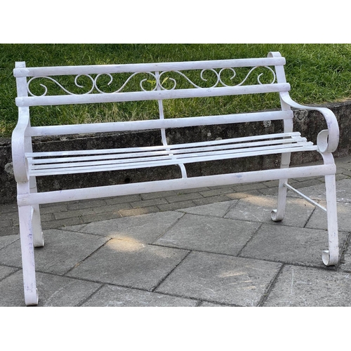 146 - GARDEN BENCH, antique wrought iron and white painted with slatted back and seat and scroll arms, 120... 