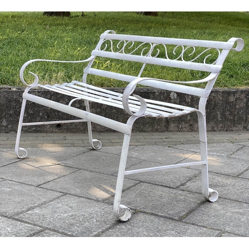 146 - GARDEN BENCH, antique wrought iron and white painted with slatted back and seat and scroll arms, 120... 