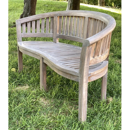 147 - BANANA GARDEN BENCH, weathered teak with curved back and slatted construction, 150cm W.