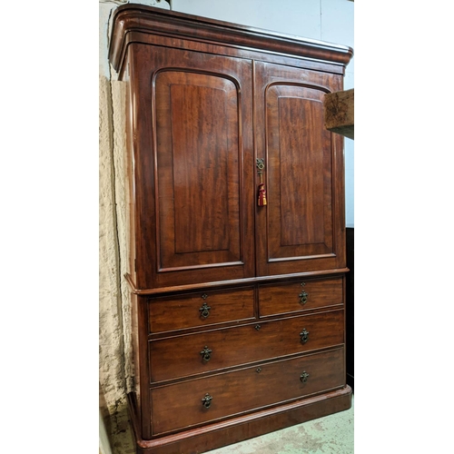 167 - LINEN PRESS, Victorian mahogany, circa 1860, with two panelled doors enclosing ticking lined hanging... 