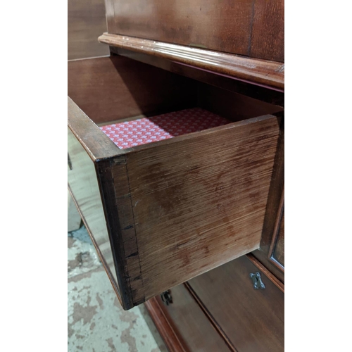 167 - LINEN PRESS, Victorian mahogany, circa 1860, with two panelled doors enclosing ticking lined hanging... 