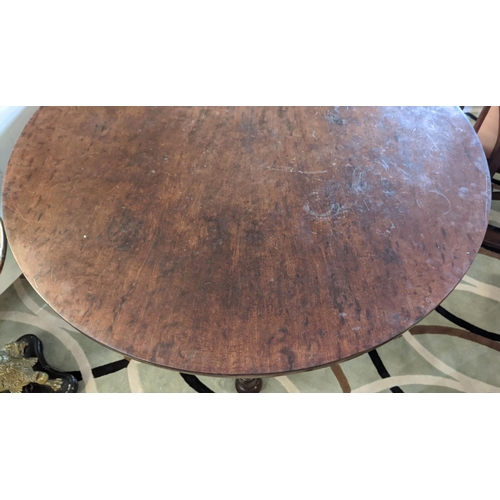 172 - BREAKFAST TABLE, William IV mahogany, with circular tilt top and brass castors, 127cm x 74cm H.