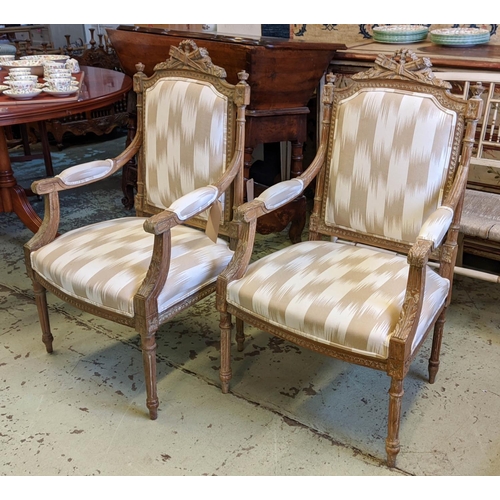 177 - FAUTEUILS, a pair, each 60cm W x 103cm H, Louis XVI style limedwood with carved showframes having to... 