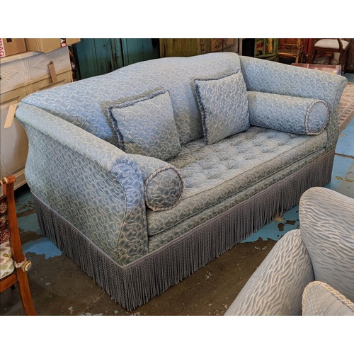 192 - SOFA, in a blue pattern fabric with a buttoned seat, 190cm x 110cm.